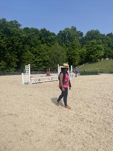 person walking on sand outside