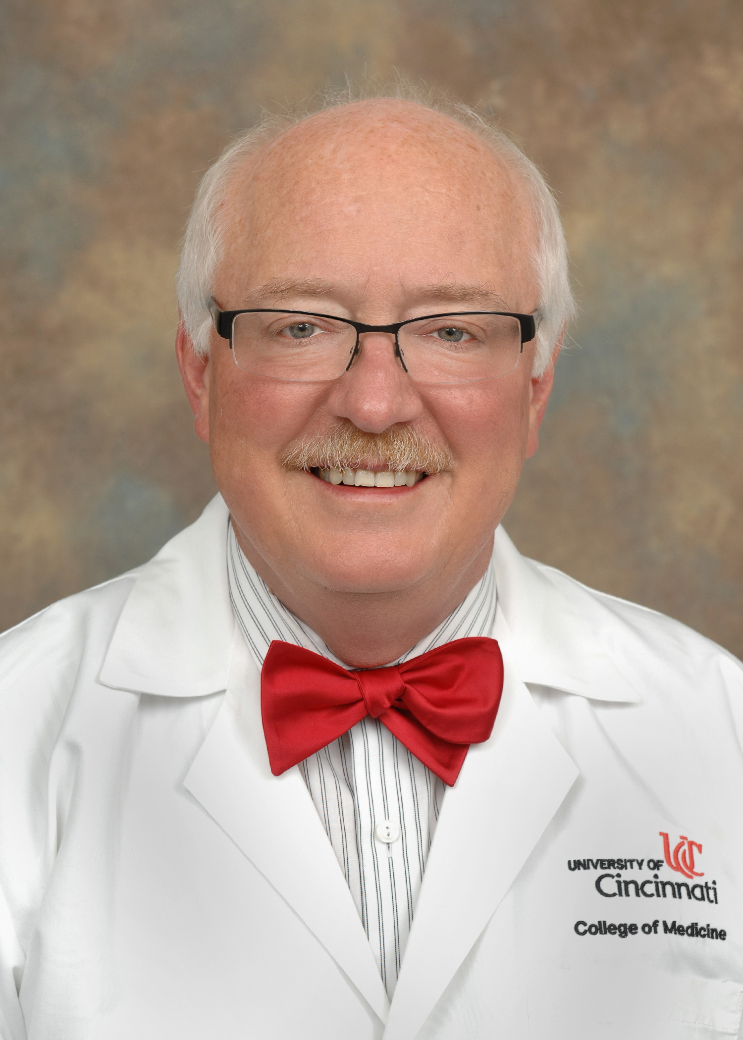 Herman_James  white coat